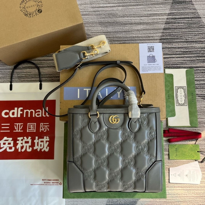 G*u*i top handle bags